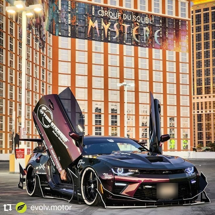 Réalisation en covering APA Gloss Gemstone Garnet Bronze sur Chevrolet Camaro (photo publiée par APA)